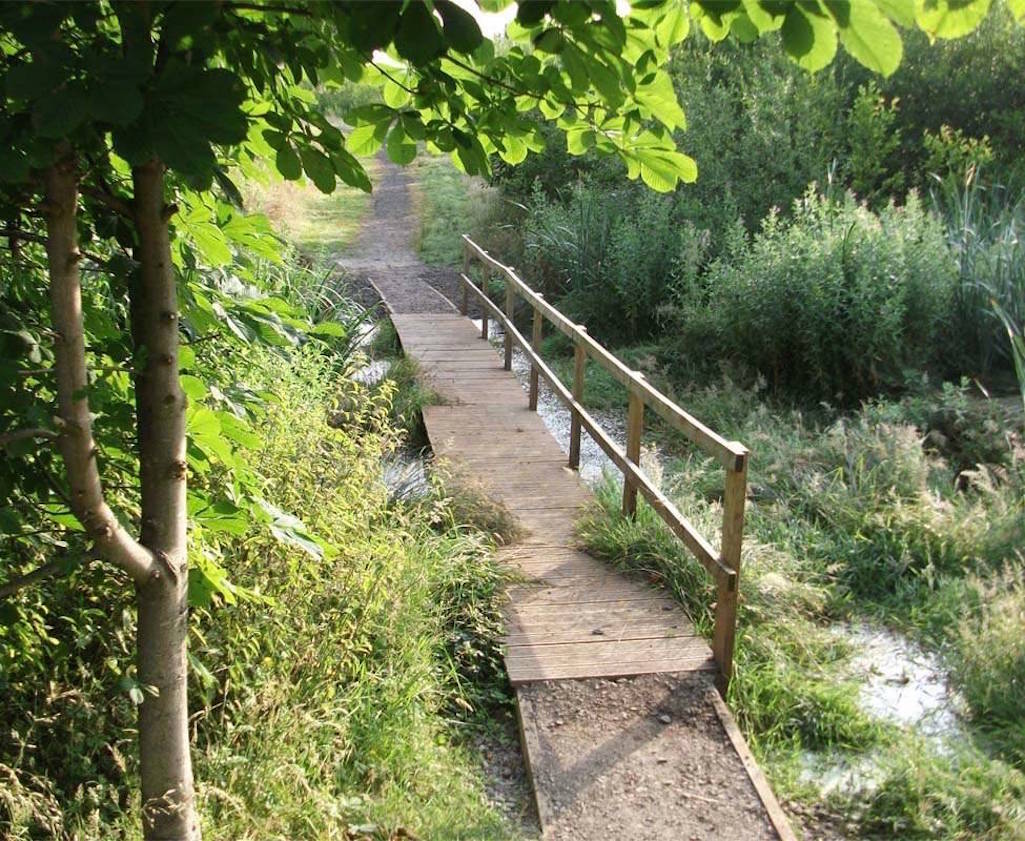 Walkway which connects Maypole Wood with Clock Face Country Park