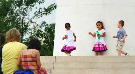 Children playing the running round Dream game