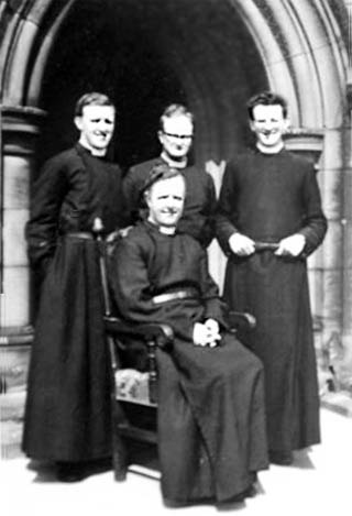 Seated is Vicar of Sutton Rev. Reg Smith with curates Bill Harrington, Fred Cheal and John Lewis